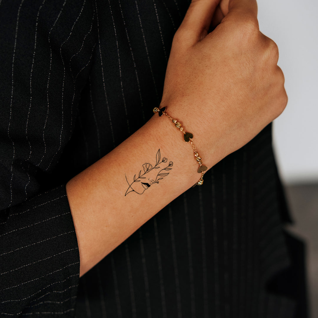 Abstrakes Blumengesicht Temporäres Tattoo